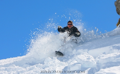 SNOWSCOOT RIDER CYRIL GAUCHER EXPLODING THE POWDER OF THE AVORIAZ SLOPES
