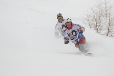 Snowscoot en poudreuse
