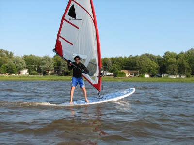 Old-style freestyle windsurfing on a SUP