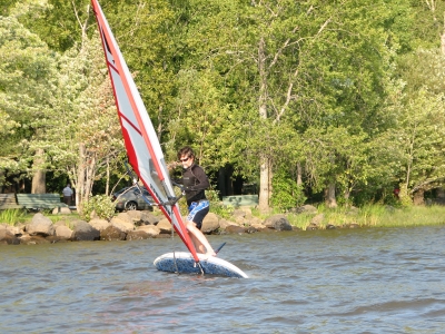 Freestyle windsurfing: railride on a SUP Starboard
